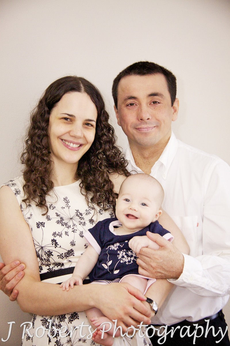Family portrait of parents with baby girl - baby portrait photography sydney